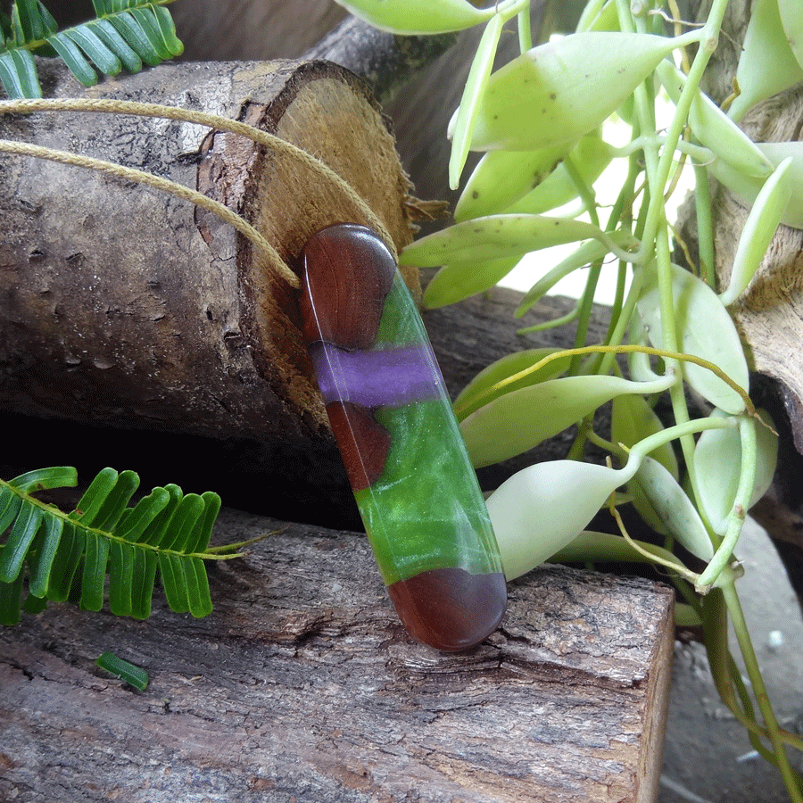 Driftwood with green and purple resin