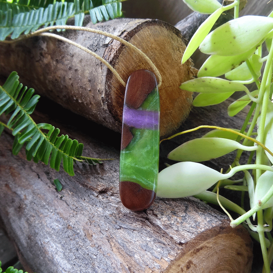 Driftwood with green and purple resin