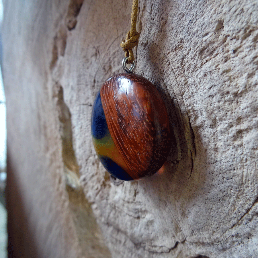 Driftwood with rainbow coloured resin