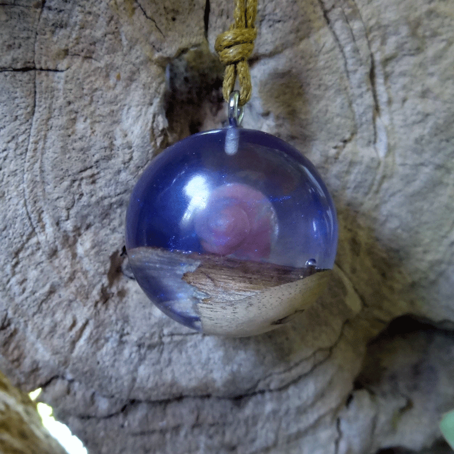 Driftwood with light purple resin and shell