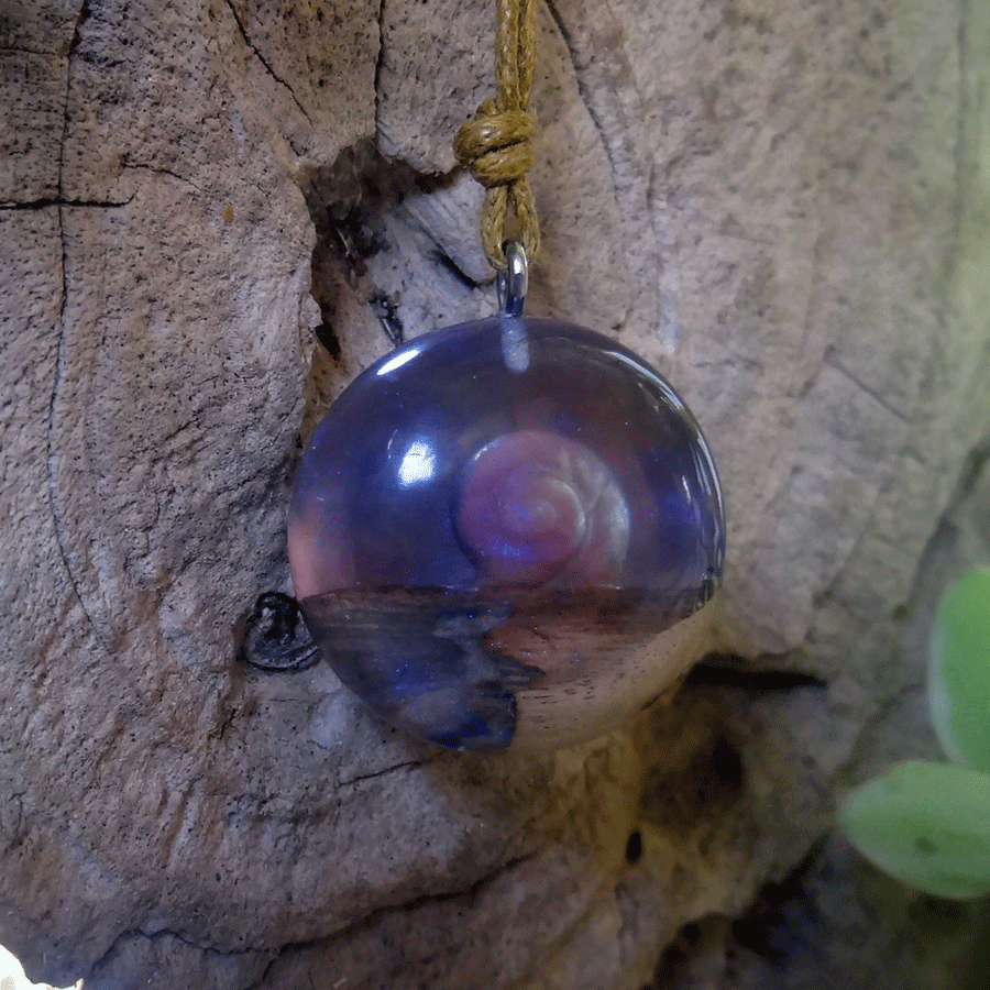 Driftwood with light purple resin and shell