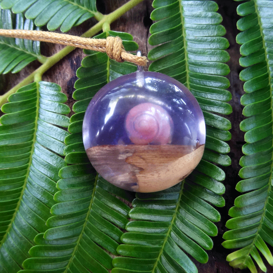 Driftwood with light purple resin and shell