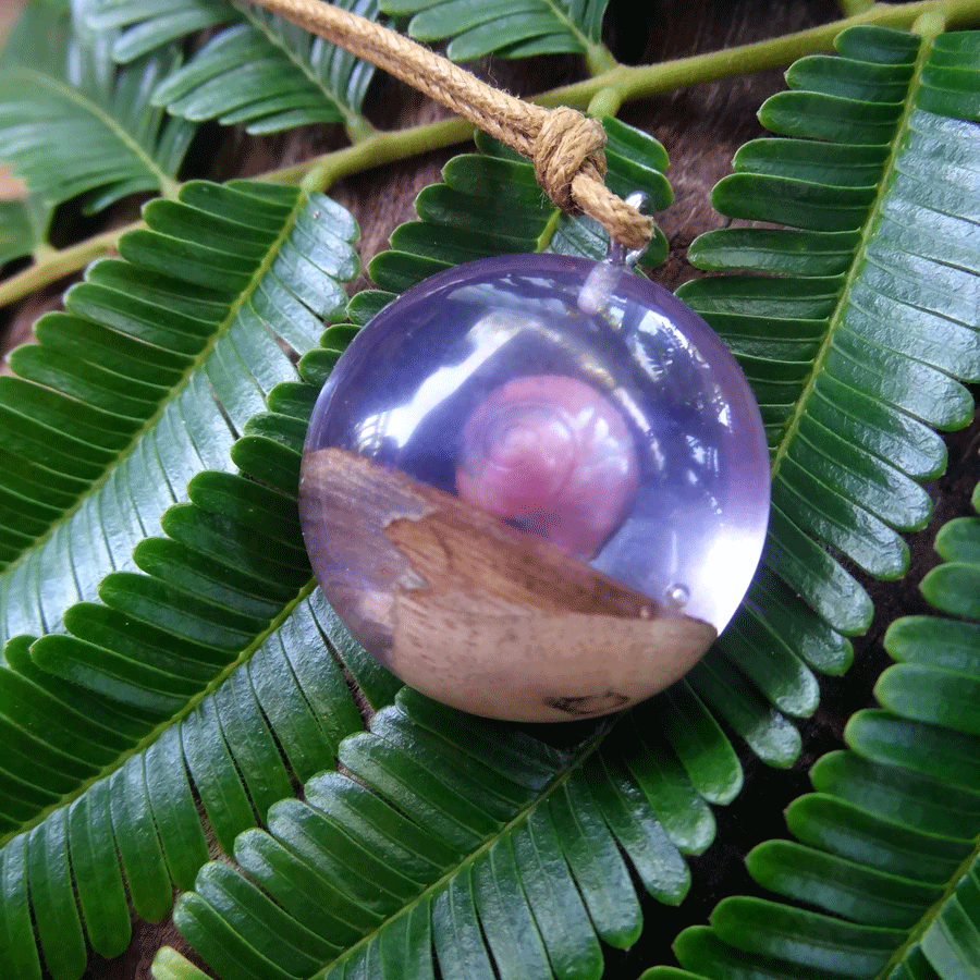 Driftwood with light purple resin and shell