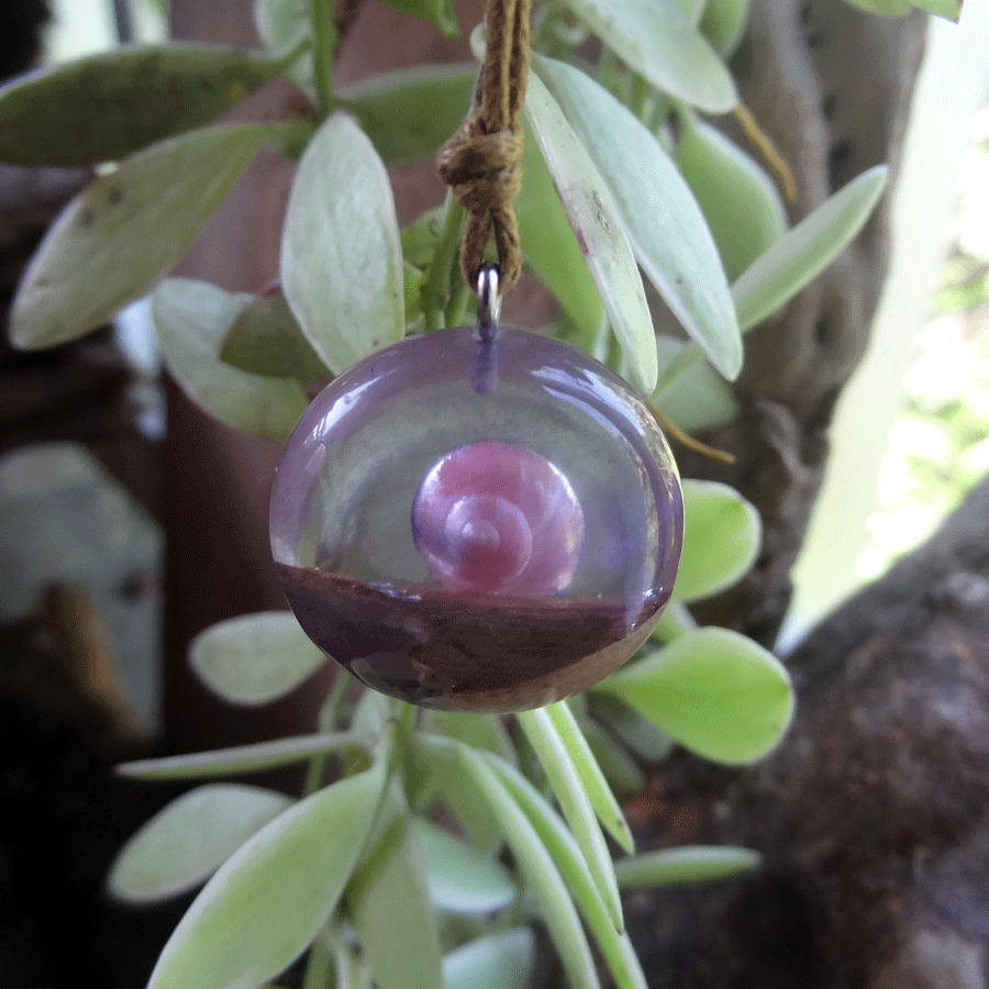 Driftwood with light purple resin and shell