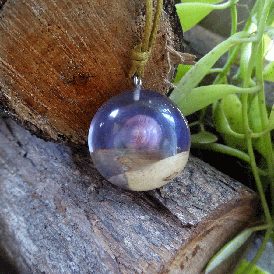 Driftwood with light purple resin and shell