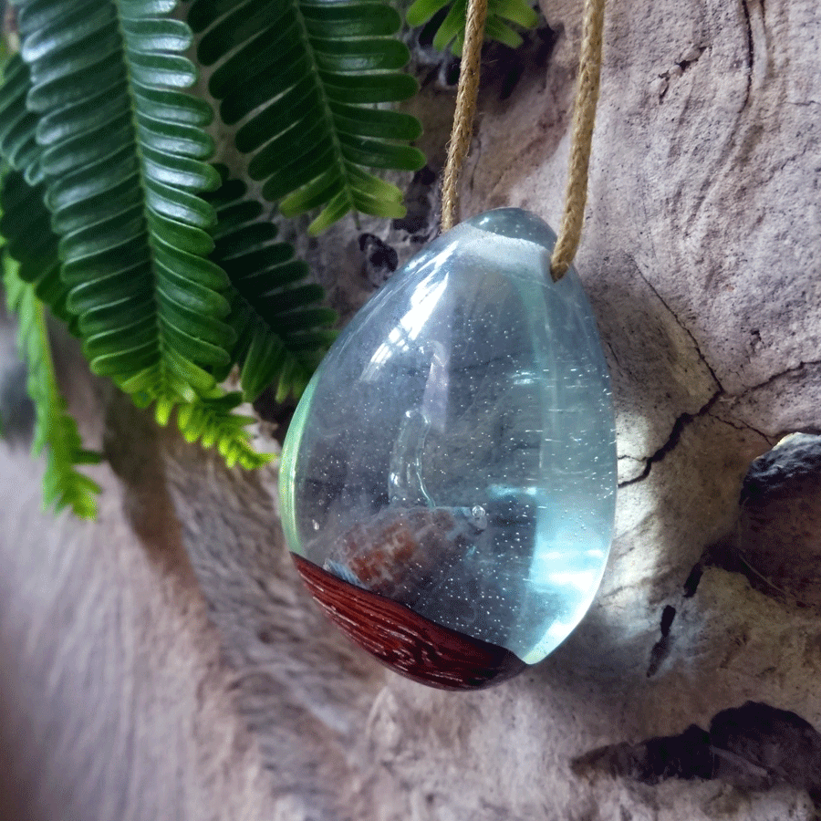 Driftwood with light blue resin and shell