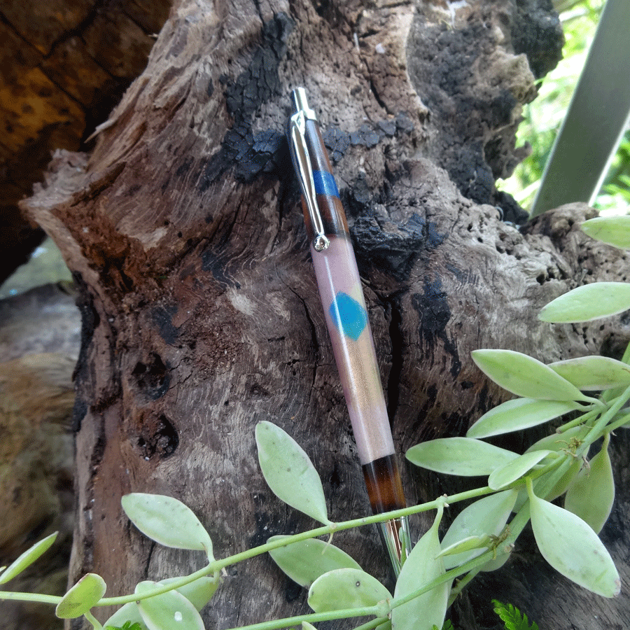 Driftwood and light pink resin pen