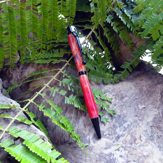 Driftwood and pink and yellow resin pen