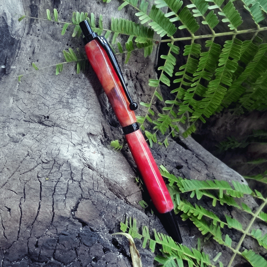 Driftwood and pink and yellow resin pen