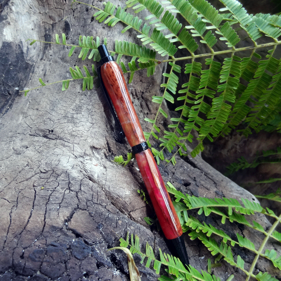 Driftwood and pink and yellow resin pen