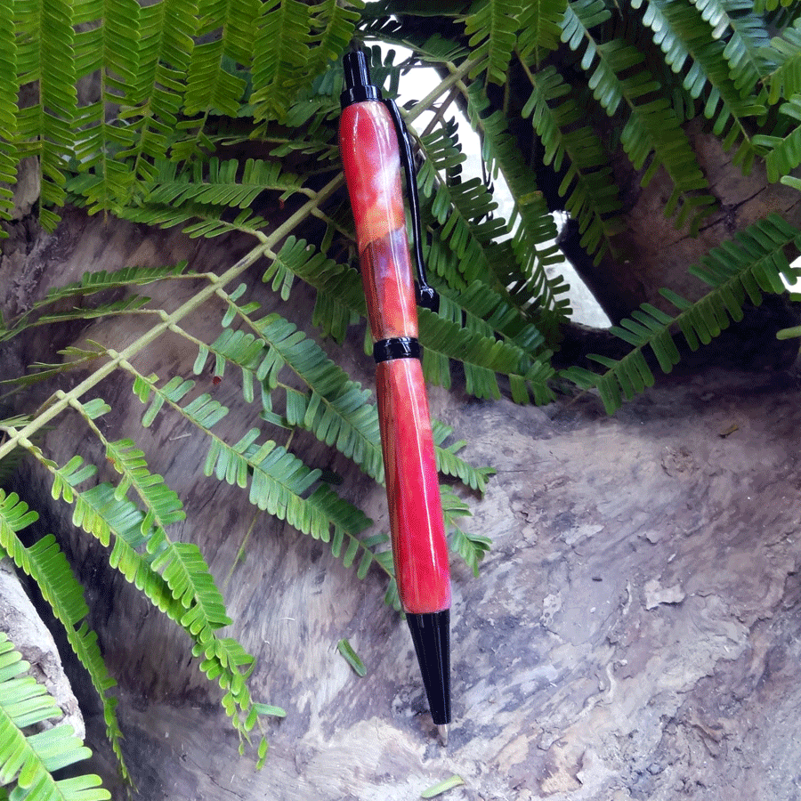 Driftwood and pink and yellow resin pen