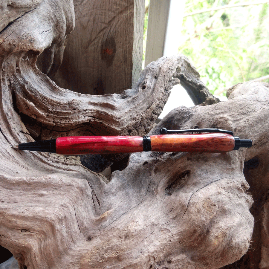 Driftwood and pink and yellow resin pen