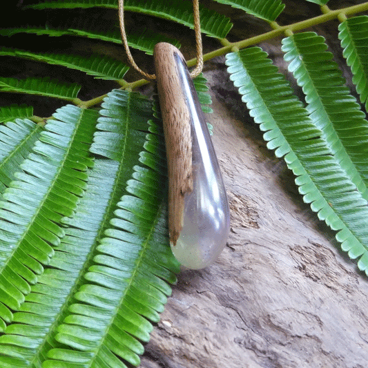 Driftwood with purple and green resin