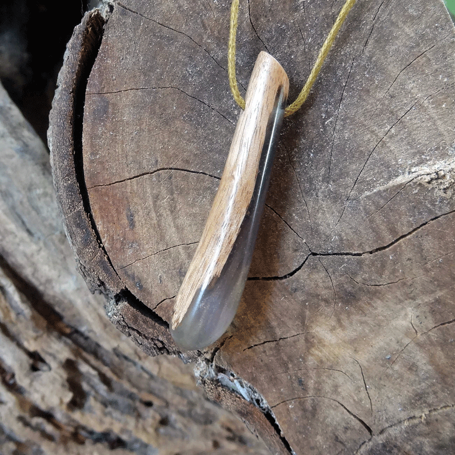 Driftwood with purple and green resin