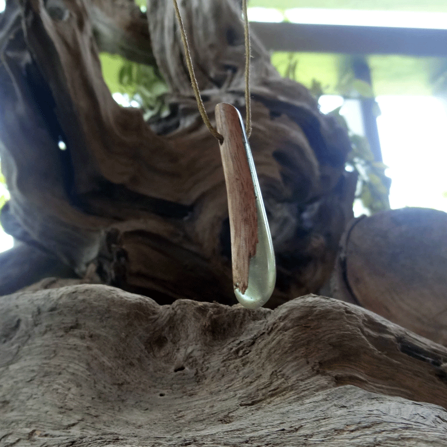 Driftwood with purple and green resin