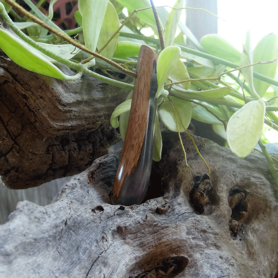 Driftwood with purple and green resin