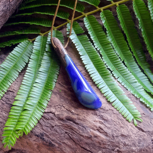 Driftwood with purple and turquoise resin