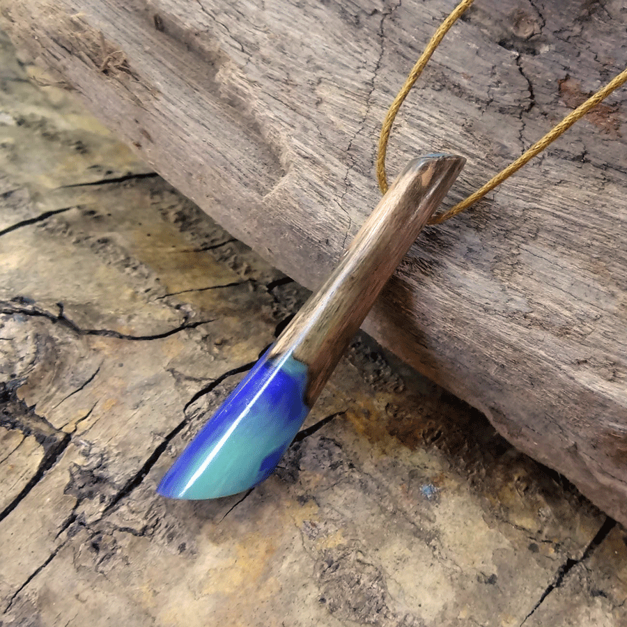 Driftwood with purple and turquoise resin