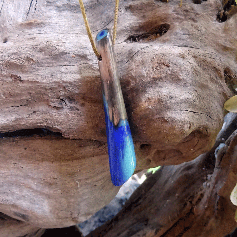 Driftwood with purple and turquoise resin