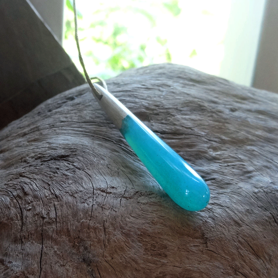 Driftwood with turquoise resin