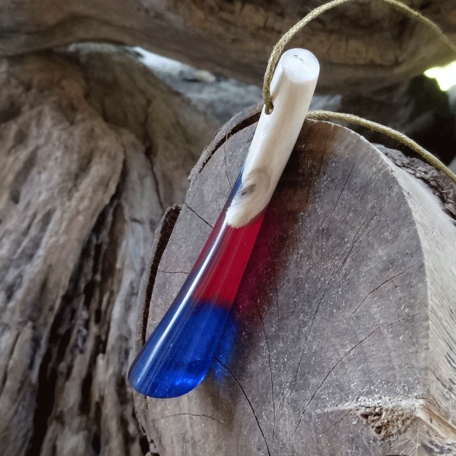 Driftwood with blue and pink resin