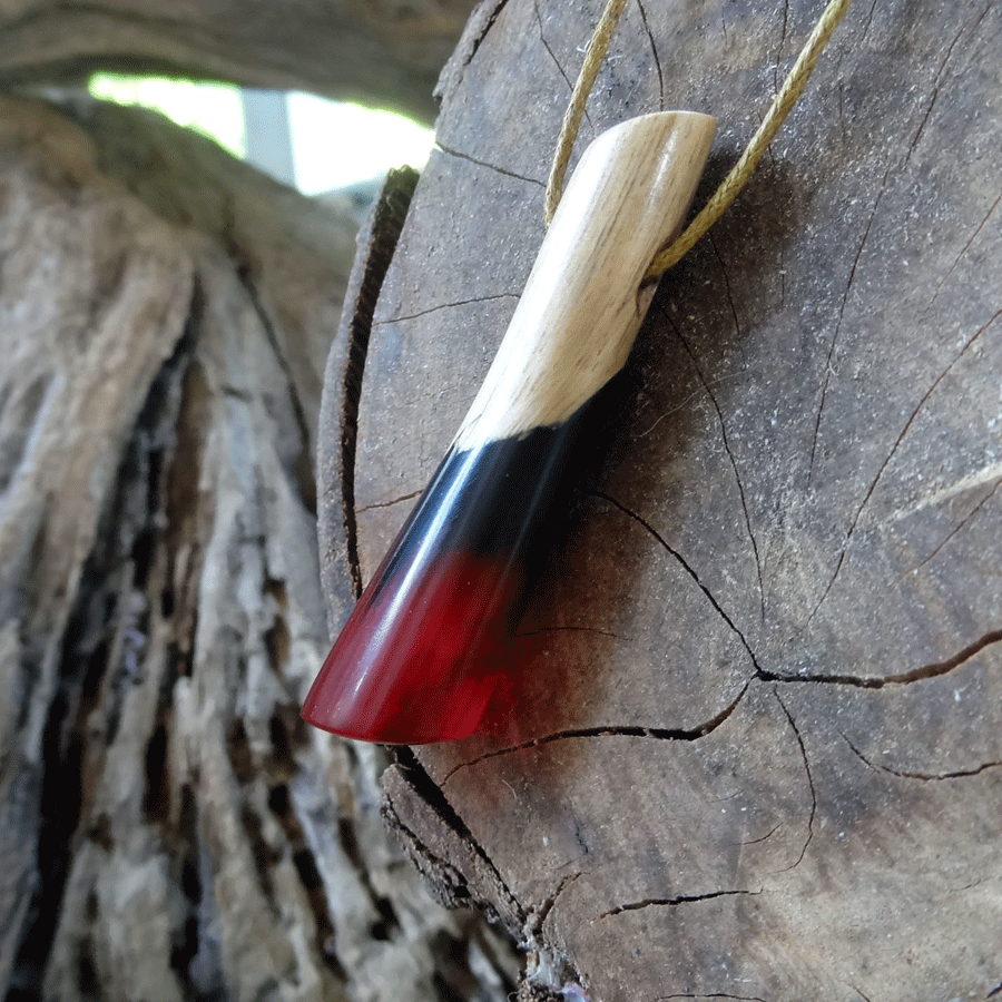 Driftwood with black and pink resin