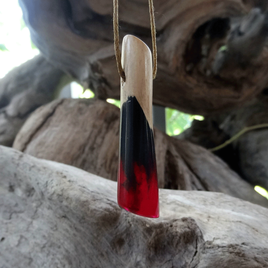 Driftwood with black and pink resin