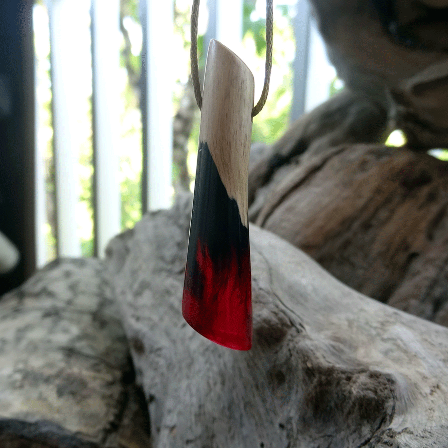 Driftwood with black and pink resin