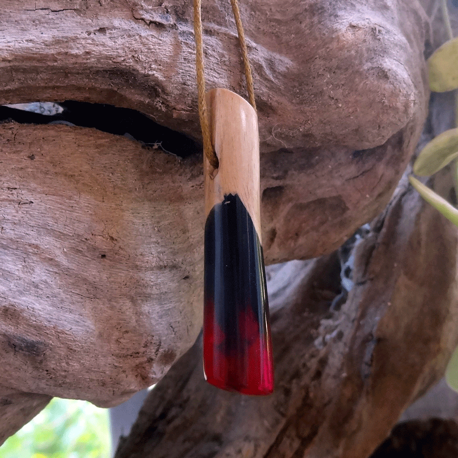 Driftwood with black and pink resin