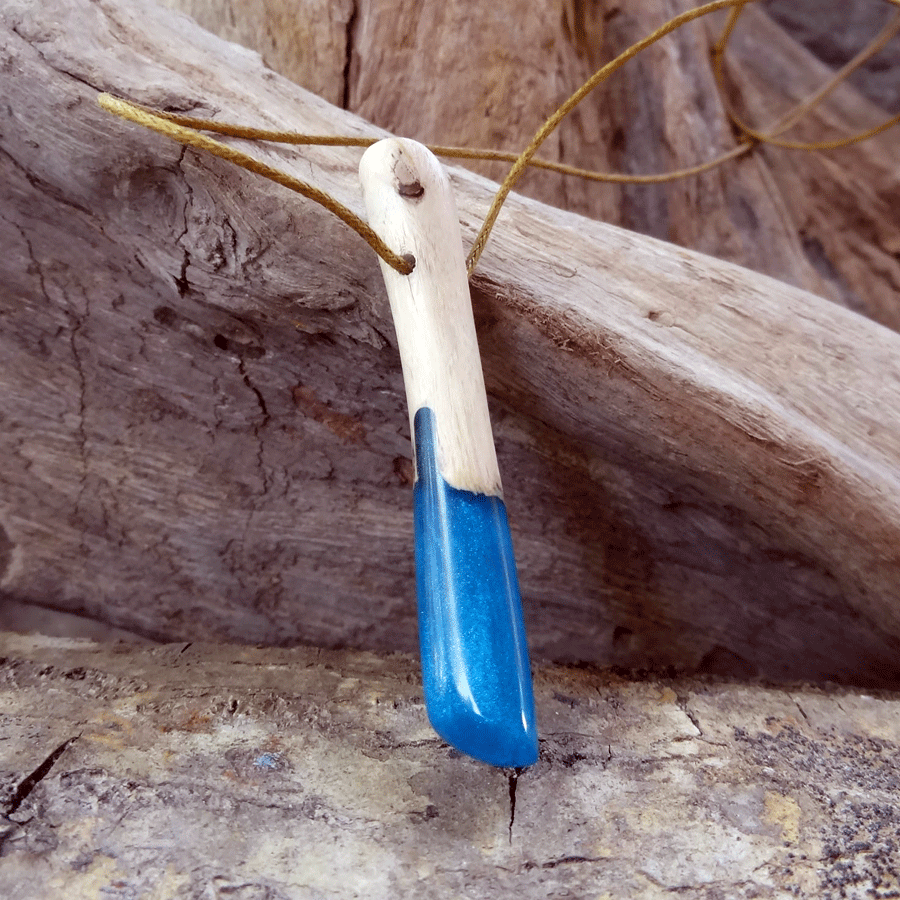 Driftwood with blue resin