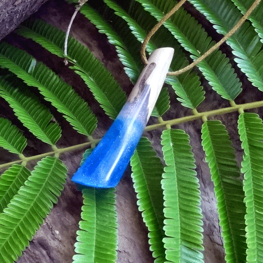 Driftwood with blue and white resin