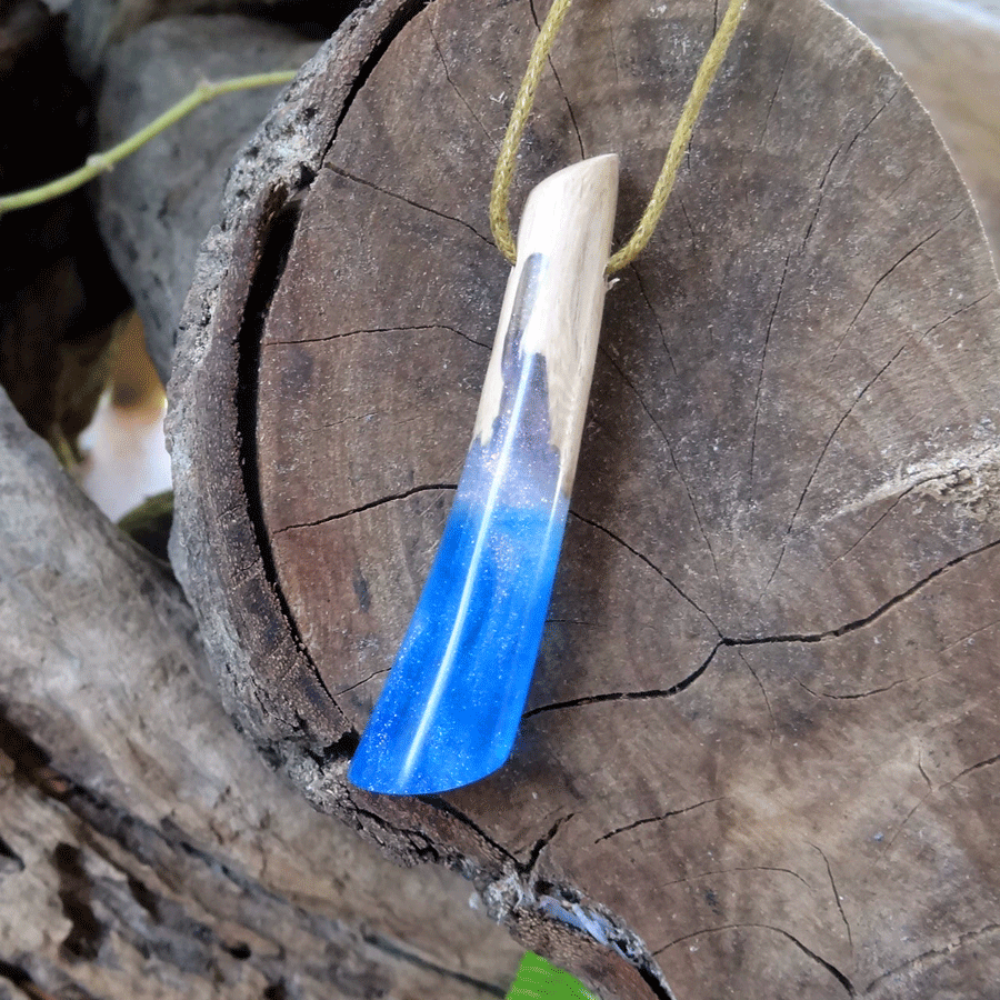 Driftwood with blue and white resin