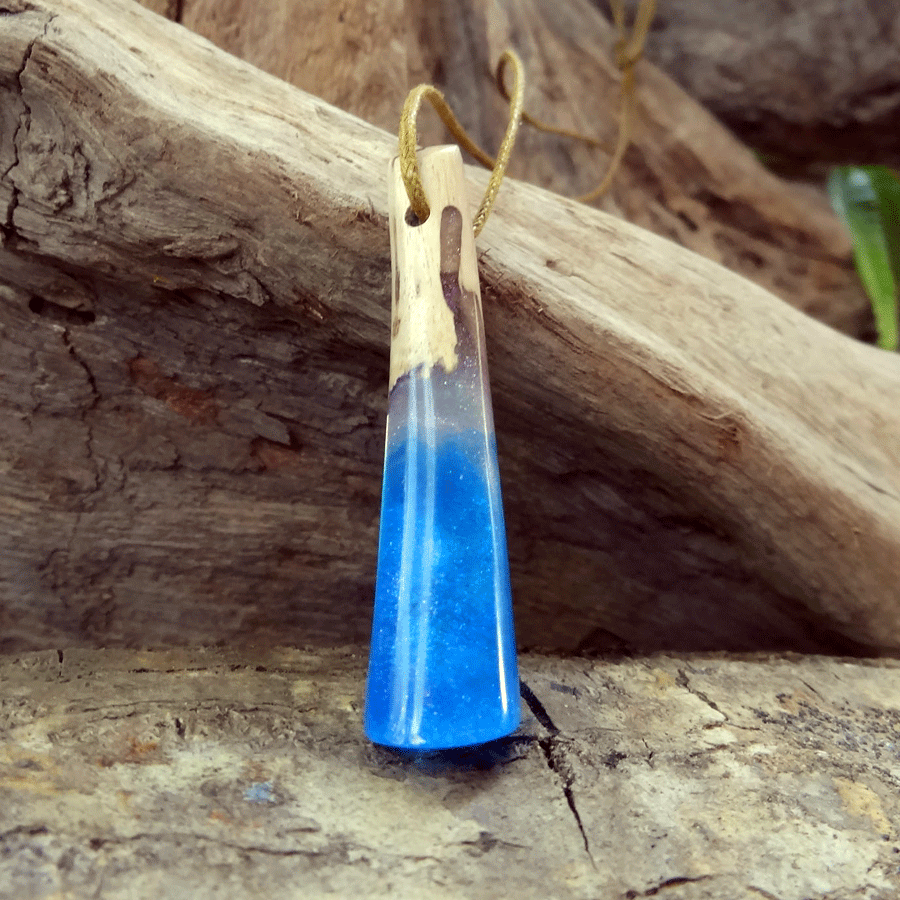 Driftwood with blue and white resin