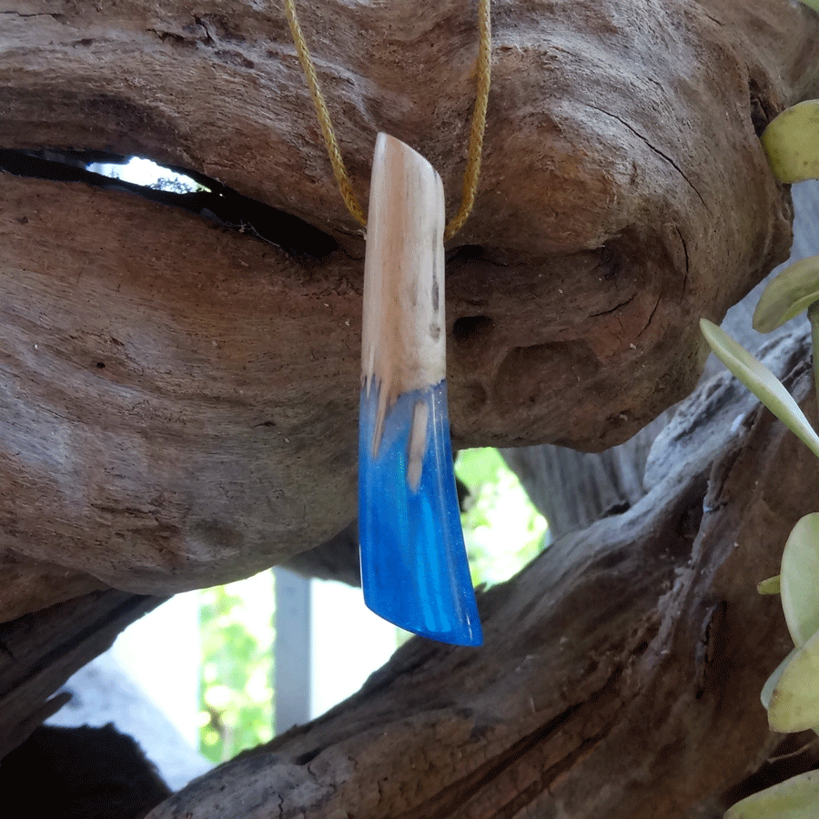 Driftwood with blue and white resin