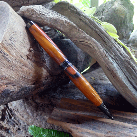 Driftwood and red and gold resin pen