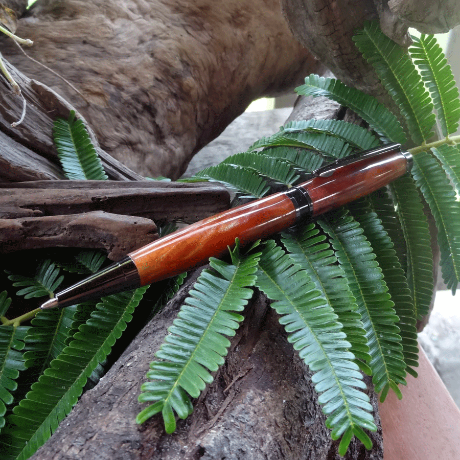 Driftwood and red and gold resin pen