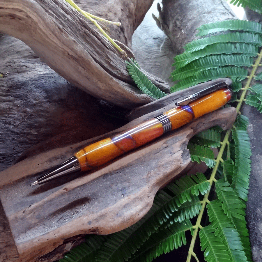 Driftwood and red, yellow and purple resin pen