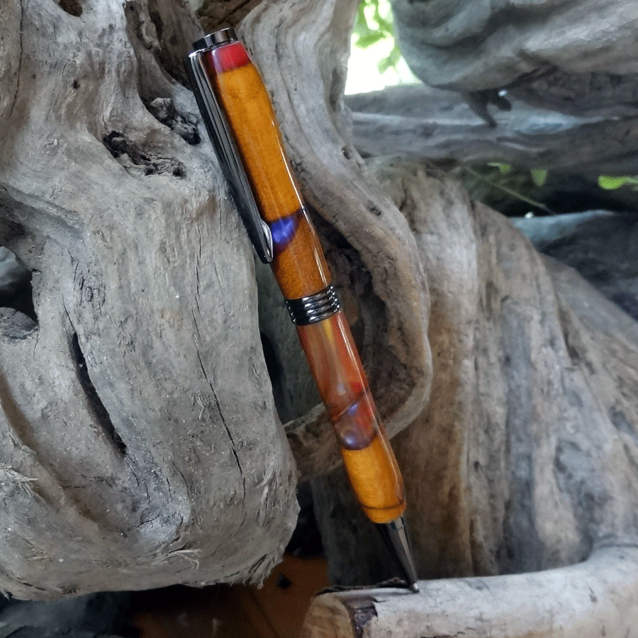 Driftwood and red, yellow and purple resin pen