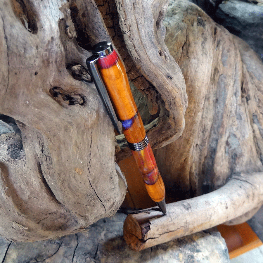 Driftwood and red, yellow and purple resin pen