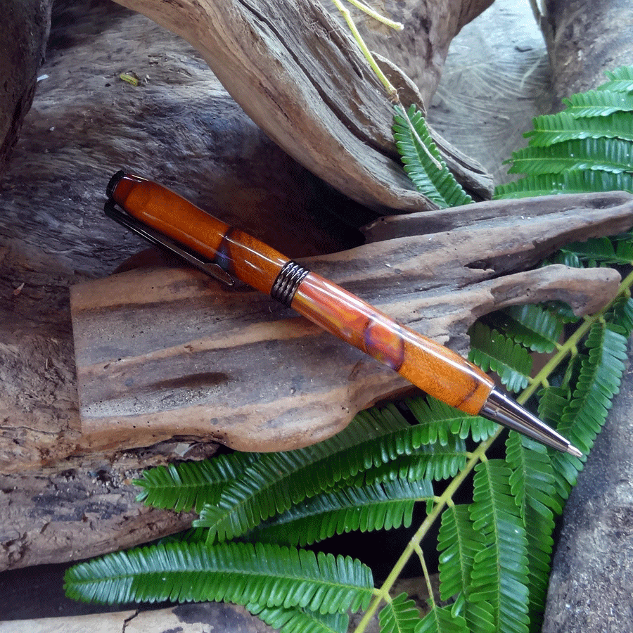 Driftwood and red, yellow and purple resin pen