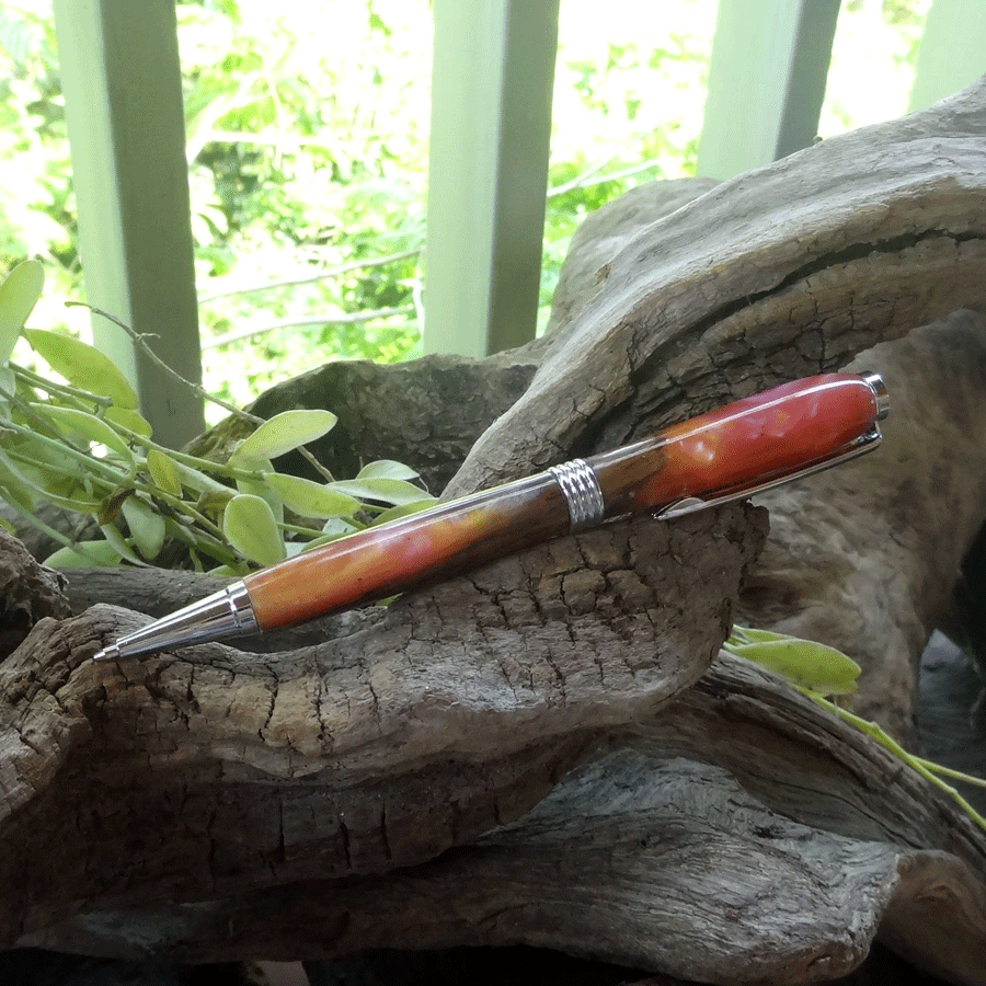 Driftwood and pink and yellow resin pen