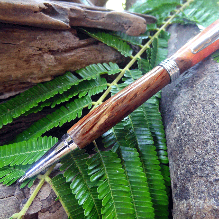 Driftwood and pink and yellow resin pen