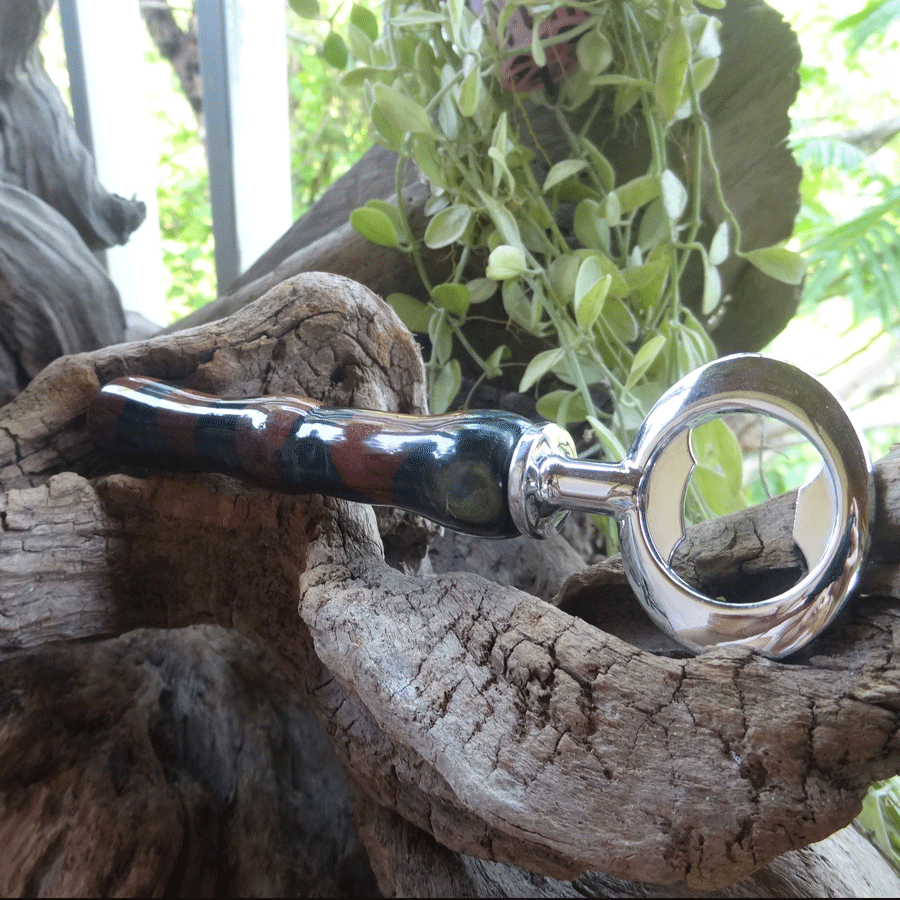 Driftwood and dark green resin bottle opener