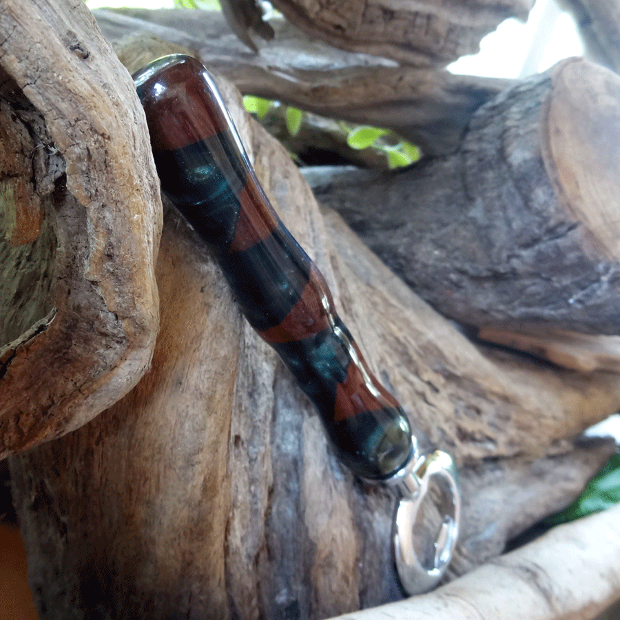 Driftwood and dark green resin bottle opener