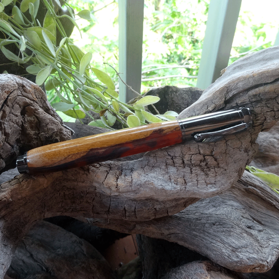 Driftwood and red pink resin fountain pen