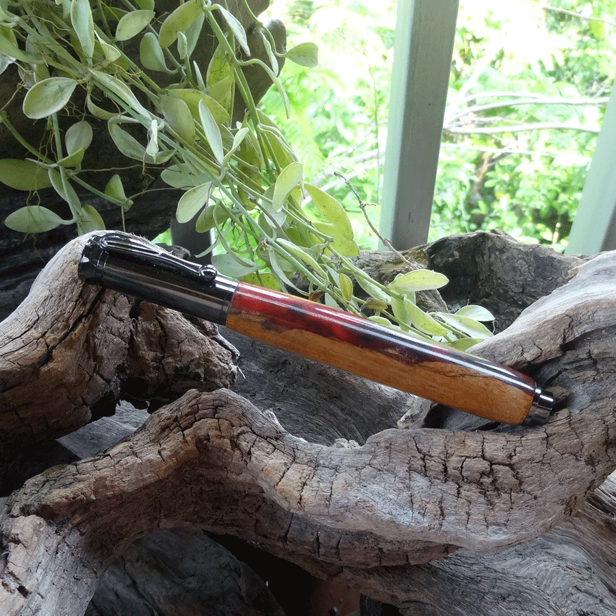 Driftwood and red pink resin fountain pen