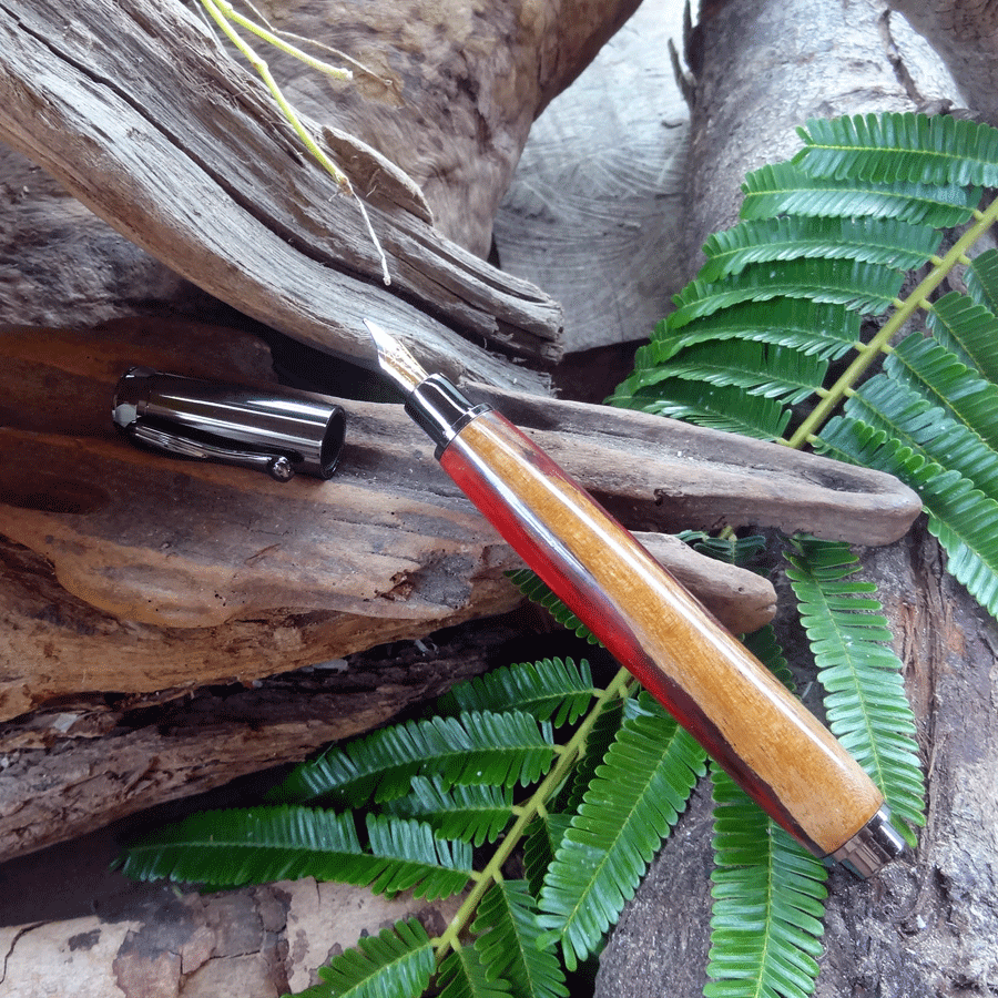 Driftwood and red pink resin fountain pen