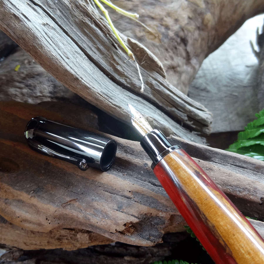 Driftwood and red pink resin fountain pen