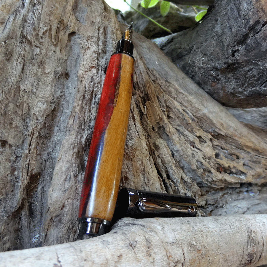 Driftwood and red pink resin fountain pen