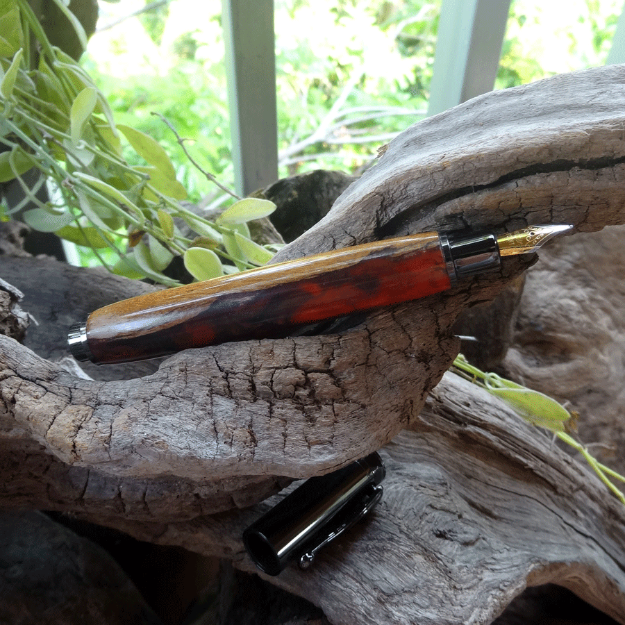 Driftwood and red pink resin fountain pen